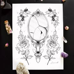 a black and white drawing on paper with flowers, butterflies and an oval mirror in the middle