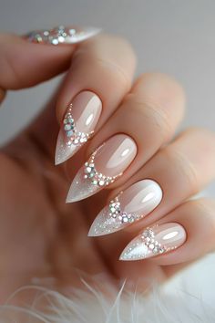 Enhance your nails with glitter white French tips and rhinestones. Follow us for more creative nail art ideas. Check out our blog on the bride’s ultimate guide to perfect wedding nails. Nails Inspo 2024 | Simple Summer Nails | Nails Design Summer | Trendy Nails | Wedding Day Nails | Minimalist Nails | Nails 2024 Summer | Elegant Touch Nails | Nails With Charms | Nails Summer 2024 | White Nails | Nails Elegant Classy | Nails Easy | Almond Nails | Elegant Nails | Nails Design With Rhinestones Wedding Day Nails, Wedding Nails For Bride, Wedding Nails Design, Nail Art Wedding, Bride Nails, Silver Nails, Bridal Nails, Elegant Nails, Classy Nails