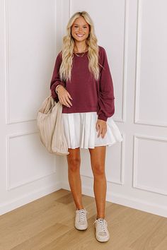 - This cutie is perfect for a cool, breezy day! With its cozy sweatshirt material and adorable pleated mini dress design, this piece will keep you looking stylish all season long. - Unlined sweatshirt material as well as soft, lightweight accent material at the skirt - A wide round neckline with a ribbed texture - Long sleeves with ribbed cuffs and unfinished rolled seam accents - An ivory colored pleated skirt - A relaxed silhouette that ends in a mini dress length hemline Mini Dress Design, Concert Fashion, Cool Breeze, Essential Dress, Sweater Jumpsuit, Pleated Mini Dress, Mulled Wine, Teacher Style, Ribbed Texture