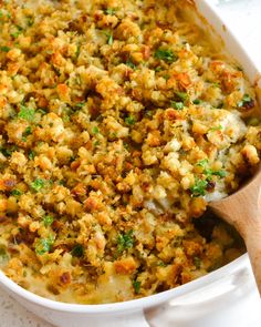 a casserole dish with meat and vegetables in it, ready to be eaten