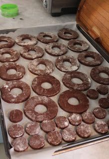 doughnuts are being cooked in an oven