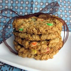 a stack of cookies sitting on top of a white plate