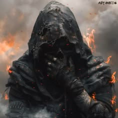 a man in a black hooded jacket holding a knife and wearing flames on his face