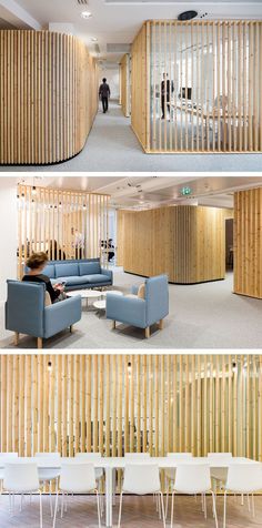 the interior of an office with wooden slats on the wall and chairs in the floor