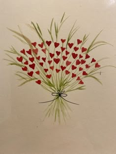 a bouquet of flowers with hearts painted on it