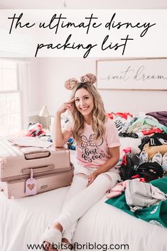 a woman sitting on top of a bed with suitcases in front of her and the words, the ultimate disney packing list