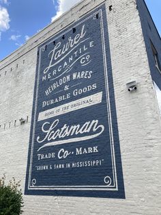 a large sign on the side of a building