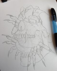 a drawing of a skull with sharp teeth