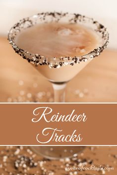 a close up of a drink in a glass with the words reindeer tracks on it