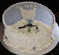 there is a cake that has been decorated to look like a bride's dress