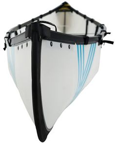 a white and blue surfboard hanging from the side of a boat with black straps