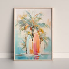 two surfboards are in the water next to a palm tree and a wall hanging