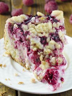 raspberry cream cheese coffee cake on a white plate