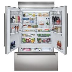 an open refrigerator with its doors wide open and full of food items on the shelves