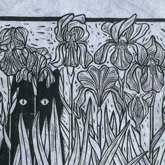 a black and white drawing of flowers in front of a wall with an abstract design