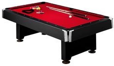 a pool table with two cues and balls on it