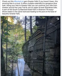 an image of a waterfall in the middle of a forest with stairs leading up to it