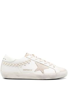 white calf leather smooth grain front lace-up fastening branded heel counter faux-pearl detailing logo print to the side logo-print tongue signature star patch to the sides perforated detailing round toe branded insole rubber sole This piece comes complete with a protective dust bag. Pearl Sneakers, Round Toe Sneakers, Detailing Logo, Gold Sneakers, Golden Goose Deluxe Brand, Brown Sneakers, Iconic Bags, Buffalo Leather, Super Star