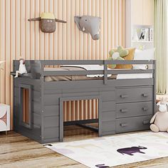 a child's bedroom with a bunk bed and desk