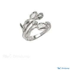 a white gold ring with three diamonds on it's sides and leaves in the middle