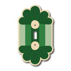 a green flower shaped light switch cover with two buttons on the front and one in the middle