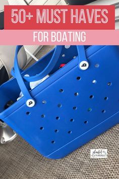 a blue tote bag with the words 50 must haves for boating