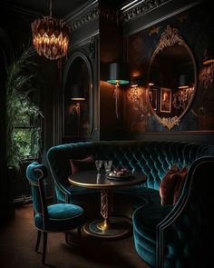 an elegant dining room with blue velvet couches and round tables in front of a mirror