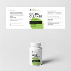 a bottle of colon cleanse sitting on top of a white table next to a green label