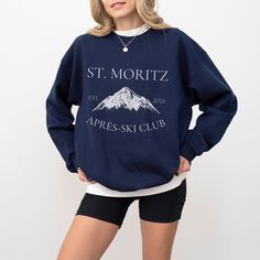 This St Moritz Ski Club sweatshirt is the perfect way to elevate your ski wardrobe and pay tribute to the alpine elegance of St Moritz Switzerland. Crafted for comfort and style, this Saint Moritz Crewneck is perfect for après-ski gatherings or casual outings in the charming town. Immerse yourself in the spirit of the wonderful ski season, whether you're hitting the slopes or cozying up by the fire. Ideal for any situation, a unisex heavy blend crewneck sweatshirt is pure comfort. These garments are made from polyester and cotton. This combination helps designs come out looking fresh and beautiful. The collar is ribbed knit, so it retains its shape even after washing. There are no itchy side seams on these sweaters.  - 50% cotton, 50% polyester - Medium-heavy fabric (8.0 oz/yd² (271.25 g/m Sporty Winter Sweater With Logo Print, Winter Sports Sweater With Logo Print, Crew Neck Sweatshirt For Winter Sports, Sporty Crew Neck Top For Ski Season, Sporty Tops For Ski Season, Sporty Top For Ski Season, Sporty Crew Neck Skiing Tops, Crew Neck Tops For Ski Season, Long Sleeve Ski Tops For Ski Season