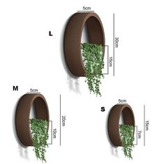 two brown metal wall mounted planters with green plants in them and measurements for each one