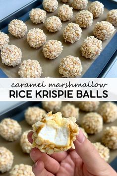 rice krispie balls with marshmallows on top and in the middle, being held up by a hand