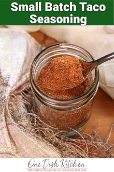 small batch taco seasoning in a glass jar with a spoon