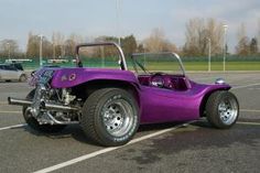 a purple car parked in a parking lot