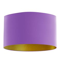 a purple and gold lamp shade on a white background