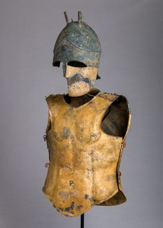 an ancient roman soldier's helmet is displayed