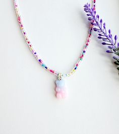 This super adorable gummy bear charm necklace is the perfect gift for any girls who love to accessorize with fun colorful beads!  How to order Just add to cart! The necklace has an extender so you can choose how long or short you like it! Please reach out with any questions! Cute Beaded Charm Necklaces For Gifts, Cute Beaded Charm Necklace As Gift, Playful Beaded Charm Necklaces For Gifts, Playful Beaded Charm Necklace For Gifts, Playful Beaded Charm Necklaces As Gifts, Pink Charm Necklaces With Colorful Beads As Gift, Cute Beaded Charm Necklaces, Playful Pink Charm Necklaces For Friendship, Playful Pink Charm Necklace For Friendship