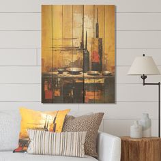 a living room scene with focus on the couch and painting hanging above it's head