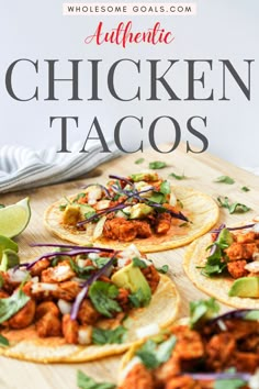 three chicken tacos on tortillas with limes and cilantro