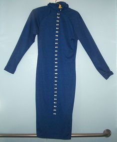 GREETINGS SHOPPERS!!! UP FOR SALE A IS: A BEAUTIFUL PRE-OWNED P.J. KLEIN Blue DRESS with 58 button design with zipper  Long Sleeve  size 7-8   Dress is Nice. No flaws, tears or fading. There is some spots on the back. Looks like they can be removed (See pic. 9). See pictures, the item in the pictures is it exact item you will receive”  Measures Top : armpit-armpit 17" and collar to hem 42" sleeve 20" waist 16".   Please check your measurements as all sizing is not the same !!! THIS DRESS IS TOP Zipper Dress, Klein Blue, Button Design, Blue Dress, Blue Dresses, Cold Shoulder Dress, Size 7, Zipper, Collar