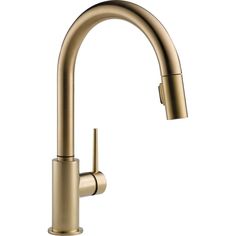 the kitchen sink faucet is shown in brushed brass finish, and features a pull - down spout