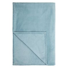 a blue blanket folded on top of a white background