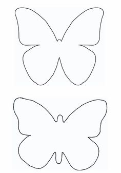 two paper butterflies cut out to make them look like they are facing each other and one is