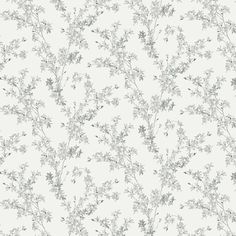 a white and gray wallpaper with small flowers