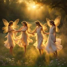 three beautiful fairy girls in white dresses holding hands