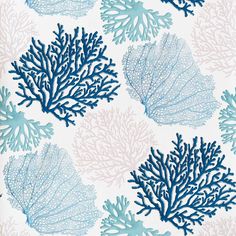 a blue and white wallpaper with corals on it