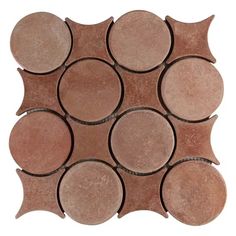 a brown tile with circles on it