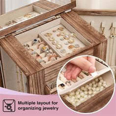 an open wooden jewelry box filled with lots of different types of rings and bracelets