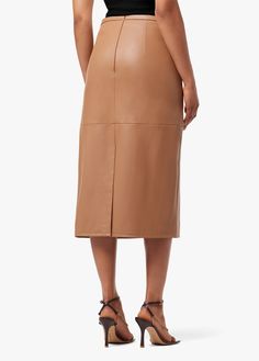 With subtle seam details on lush faux leather, the Doreen midi is your ‘up for anything’ skirt. Tuck in a turtleneck or crisp button down for a modern, yet classic look, throw on a tee and jean jacket for a more casual vibe, or add a shimmery top to this fawn-colored skirt for a stunning Friday night feel.We create unique and special products. Due to the nature of vegan leather, color from other surfaces or garments may absorb or transfer onto this fabric. Please ensure garments are stored separate from dark colors to avoid color absorption and/or transfer.
28 3/4" RISE100% Vegan LeatherMODEL IS WEARING SIZE SMALL 28 3/4" front rise 30" back rise 21 1/2" leg opening Vegan Leather Skirt, Skirt Fits, Faux Leather Skirt, Fitted Skirt, Autumn Fashion Women, Leather Wraps, Womens Fall, Denim Fabric, S Models