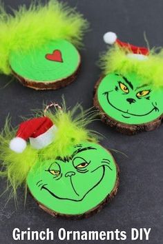 grinch ornaments made out of tree slices