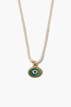 A necklace of petite freshwater rice pearls with a striking green hand-rolled clay evil eye pendant is a playful take on this classic symbol of protection. A dainty piece to layer or style solo.18k gold plated sterling silver.16 - 18" adjustable.Handmade in Vietnam. Beaded Jewelry With Charms, Dainty Necklace Stack, Clay Necklace Pendant, Gold Evil Eye Jewelry, Olive Necklace, Layer Necklaces, Necklaces Layered, Fantasy Earrings, Rice Pearls